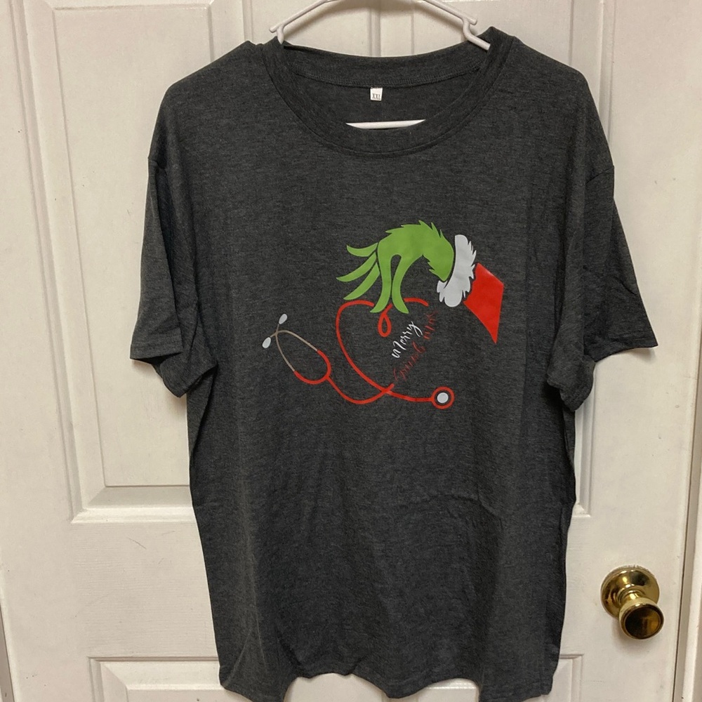 3/$20 bundle and save 
Gray Graphic Tee with Green and Red grinch  Design